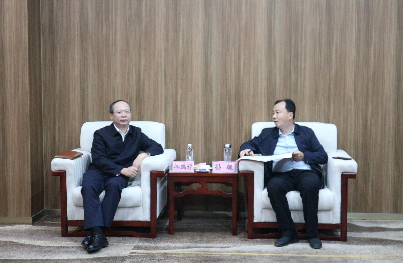 徐鵬程與湖北大冶市委副書記、市長孫輒座談