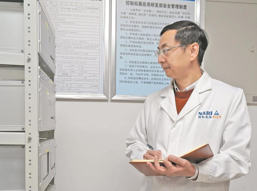 【國網(wǎng)特等勞?！坷钔簽榇箅娋W(wǎng)安全穩(wěn)定運行添“利器”